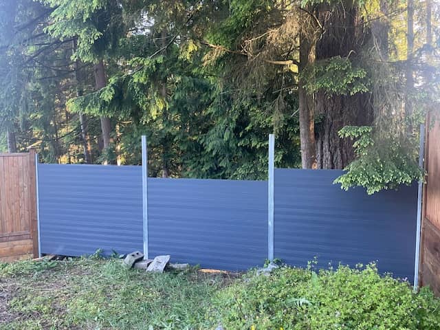 metal panels installation and design of blue fence in Coquitlam