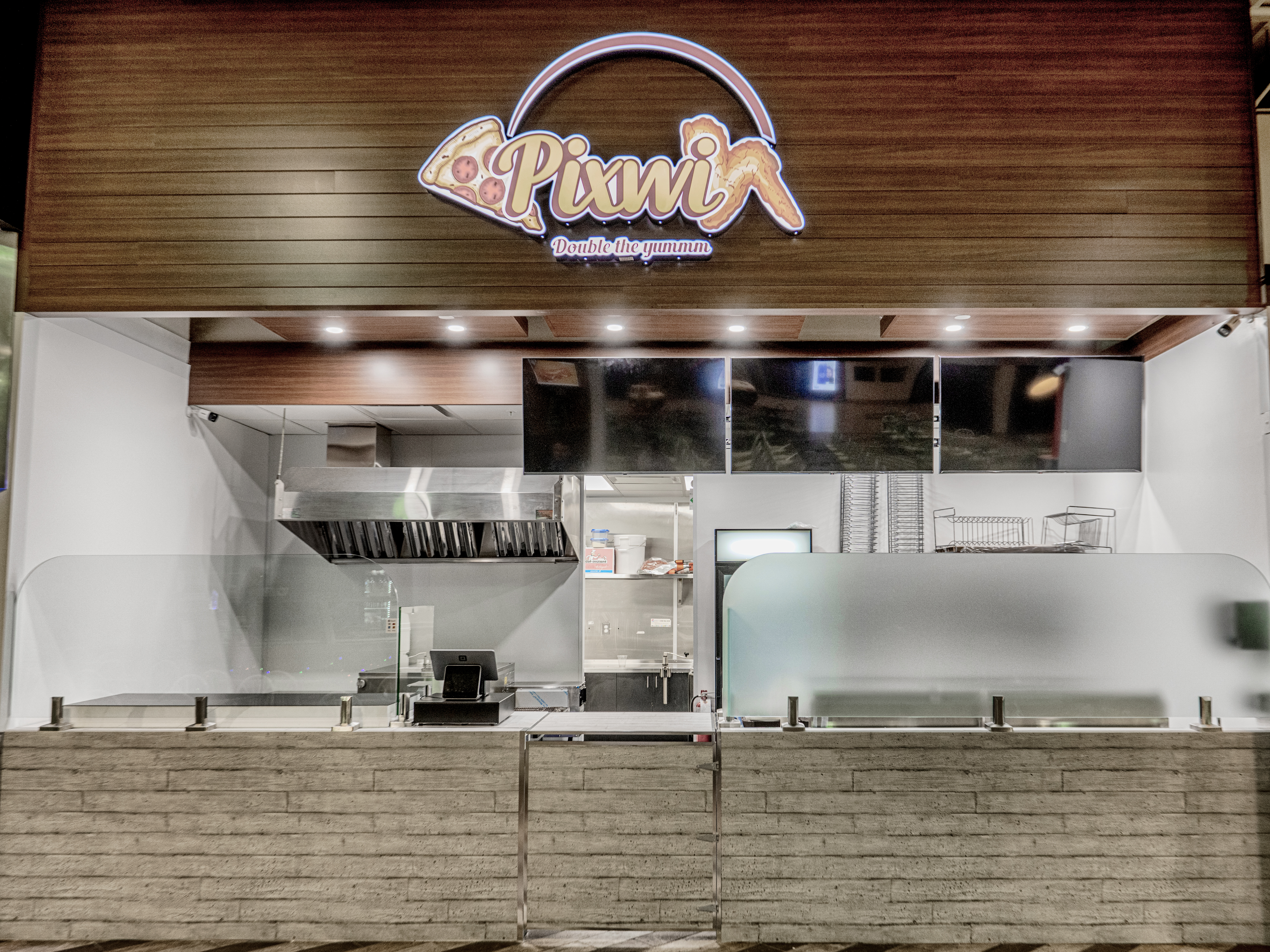 metal panels installation and design of pizza place at the food court in Maple Ridge